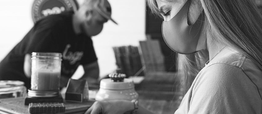 people working while wearing face masks